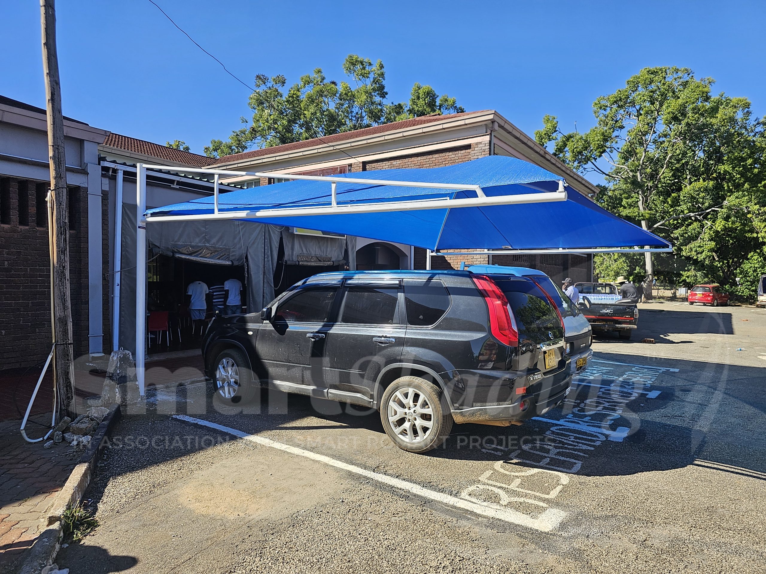 UZ (Dean of Students) – Triple Cantilever Carport Installation