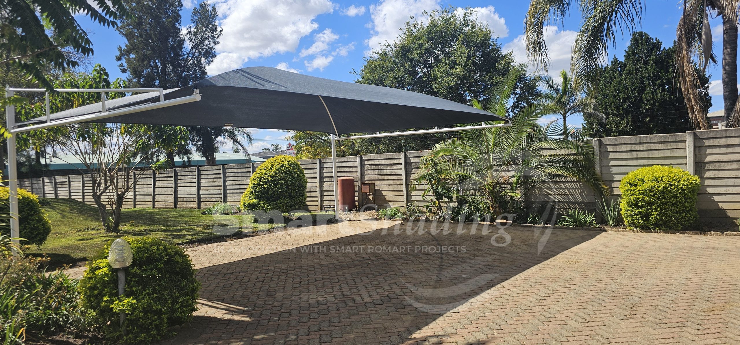 Pomona, Harare – Triple Cantilever Carport Installation